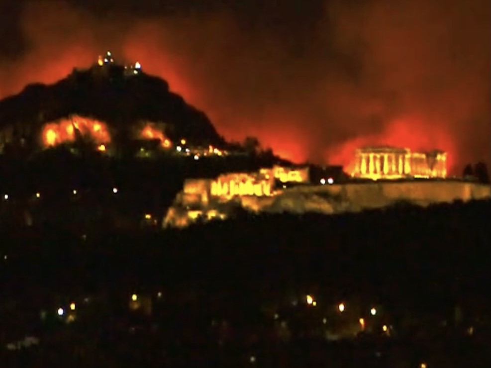 Εικόνες που κόβουν την ανάσα: Το πιο απόκοσμο background του Παρθενώνα – Οι φλόγες της Πεντέλης πίσω από την Ακρόπολη